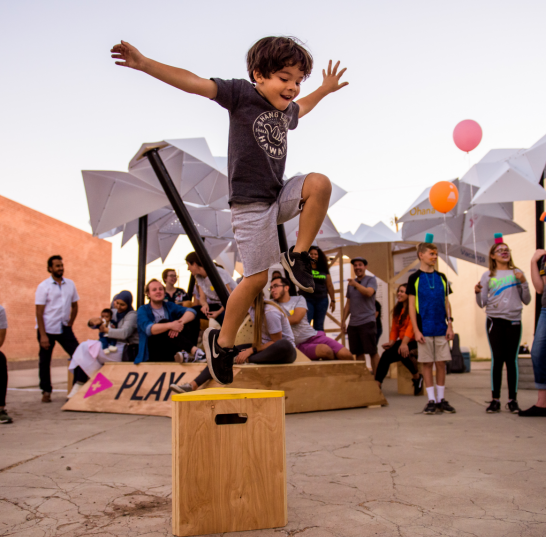 Play image of kid jumping in Arizona